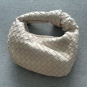 Small woven handbag.